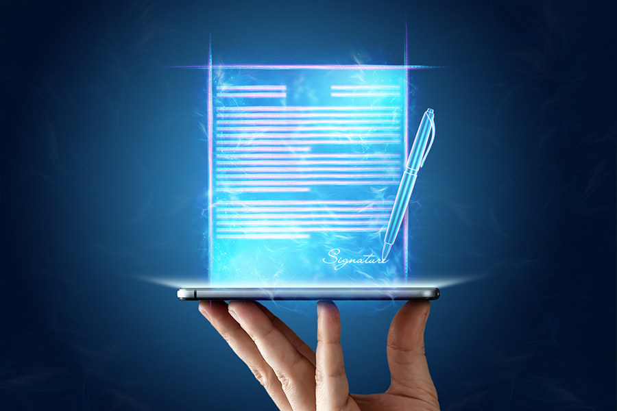 A digitally signed document displayed above a mobile device.